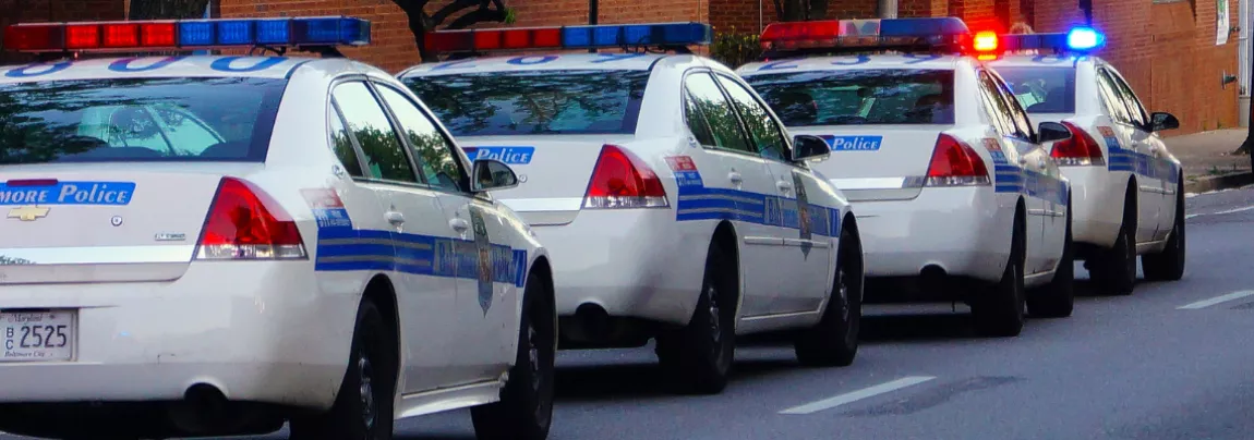 a row of police cars 