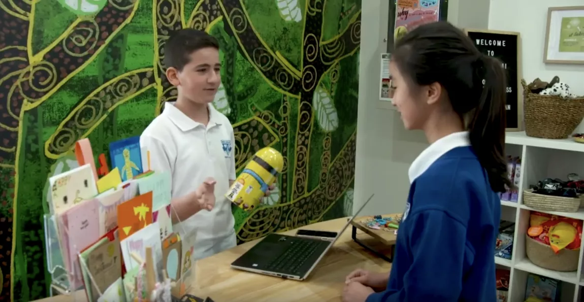 Students retailing products at their social enterprise in their school, Dorehami - a Young Change Agents initiative